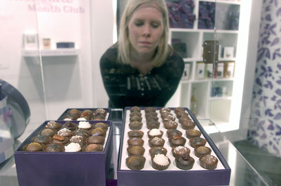 Tory Kell examines a box of boutique chocolates at Vosges Haut-Chocolat, 951 W. Armitage Ave.