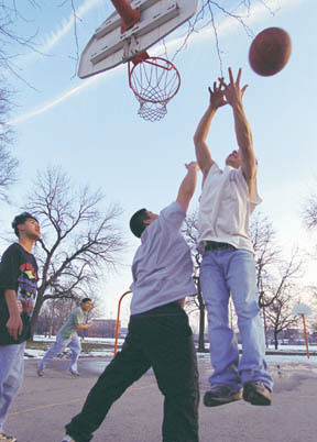 Playing basketball at McGuane Park