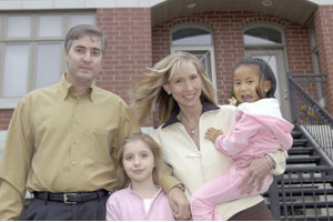 John and Diane Jacoby with their two daughters Renee (left) and Kyra