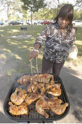 Denise Shavers fires up the barbecue at Rainbow Beach