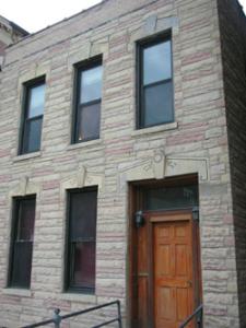 Another East Village ugly duckling – nice door, shame about the face